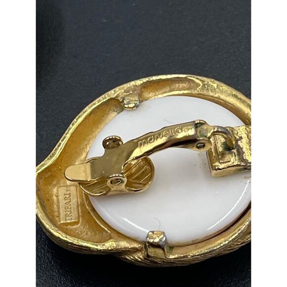 Trifari 1980s Gold Tone Resin Sea Shell Design Statement Clip
Earrings - Picture 12 of 12